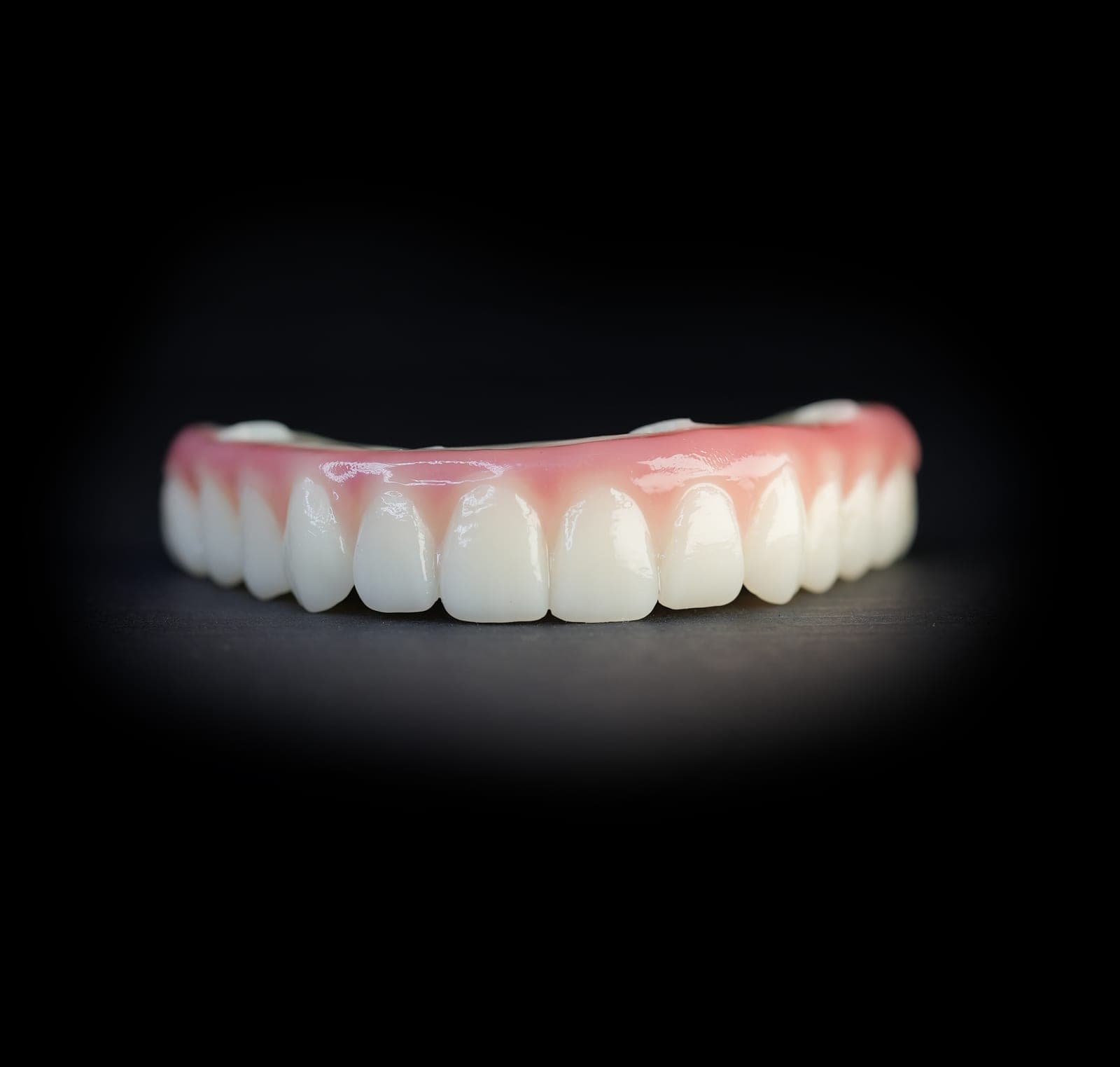 A milled PMMA prototype arch, photographed on the bench